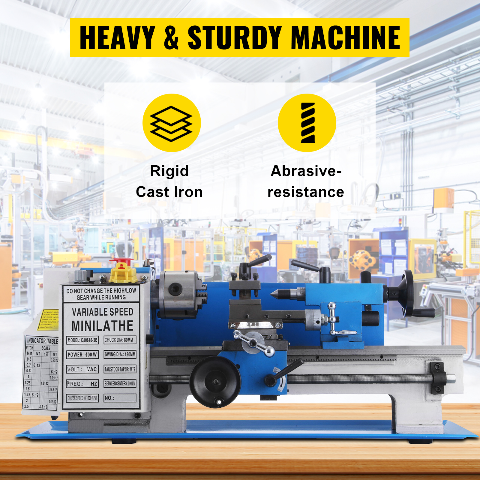 VEVOR mini metal lathe in a machinery workshop with rigid cast iron base.