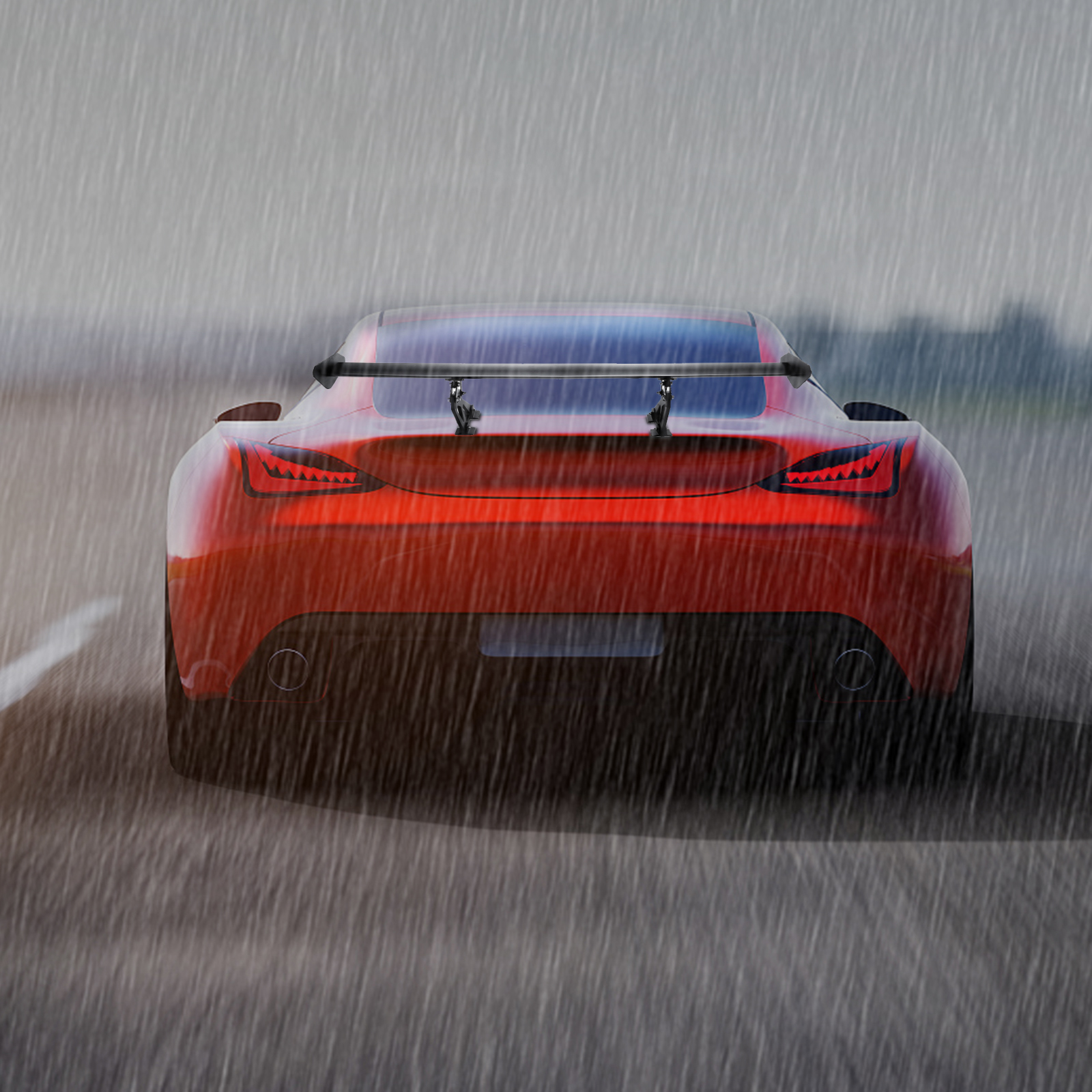 red sports car with VEVOR gt wing car spoiler driving in the rain.