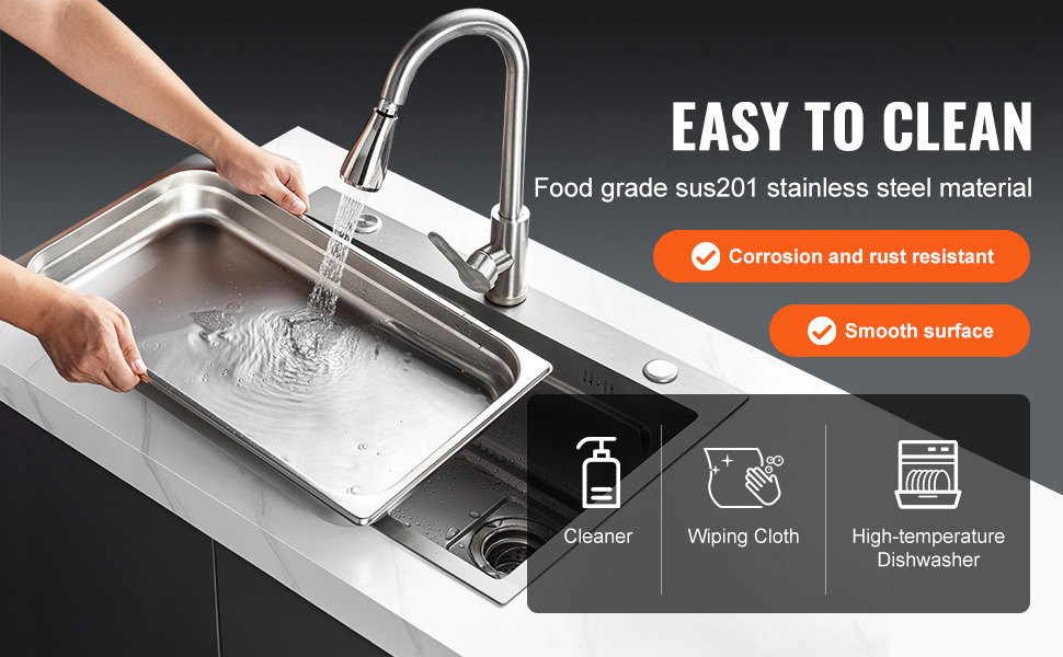 washing VEVOR hotel pans in a stainless steel sink with smooth surface and rust-resistant features.
