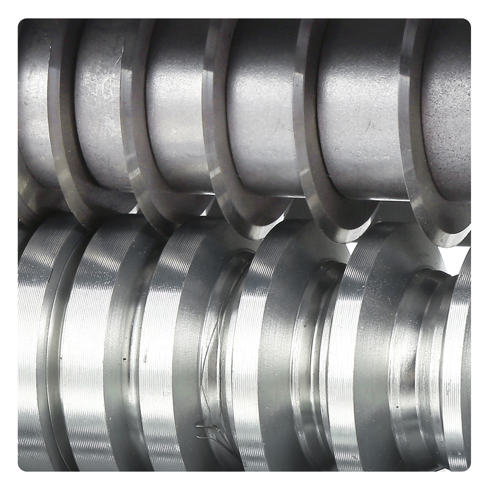 close-up of the cutting blades in a VEVOR automatic wire stripping machine with metallic finish.