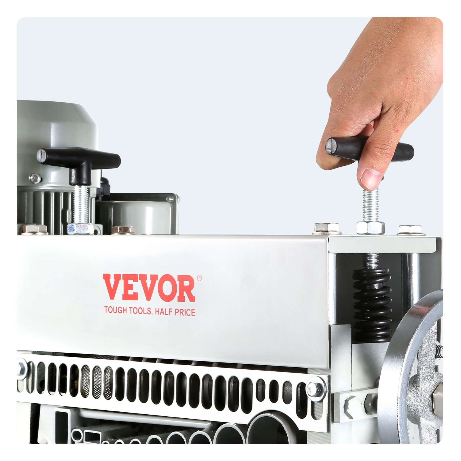 hand operating the VEVOR automatic wire stripping machine, showcasing strength and precision features.