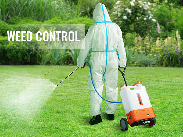 man in protective suit spraying lawn with VEVOR backpack sprayer for weed control.