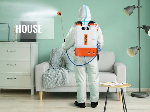 person using VEVOR backpack sprayer indoors, spraying in a pastel green room with modern decor.