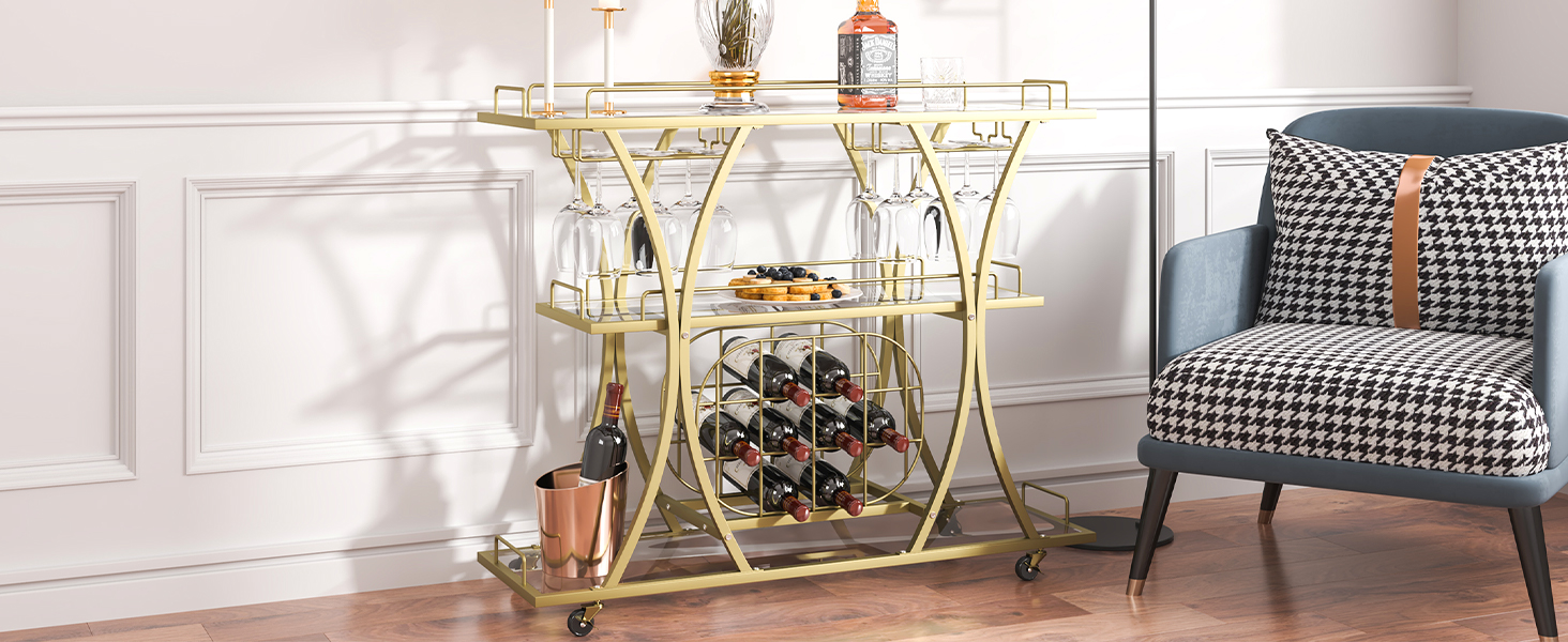 VEVOR bar cart with gold frame, glass shelves, wine rack, and glass holders beside a houndstooth armchair.