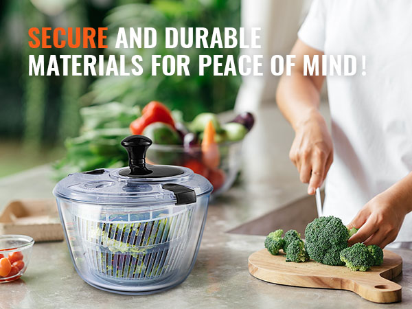 person preparing vegetables beside a VEVOR glass salad spinner on a kitchen counter.