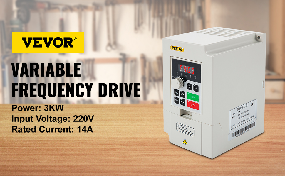 VEVOR variable frequency drive on a wooden surface with tools in the background.