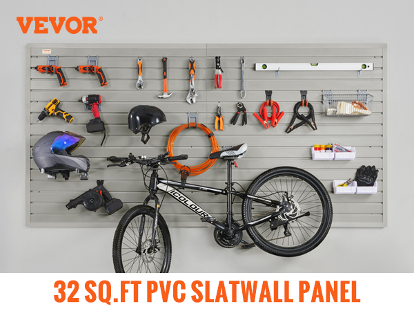VEVOR garage wall panels holding tools, bike, and accessories on a gray slatwall with text and icons.