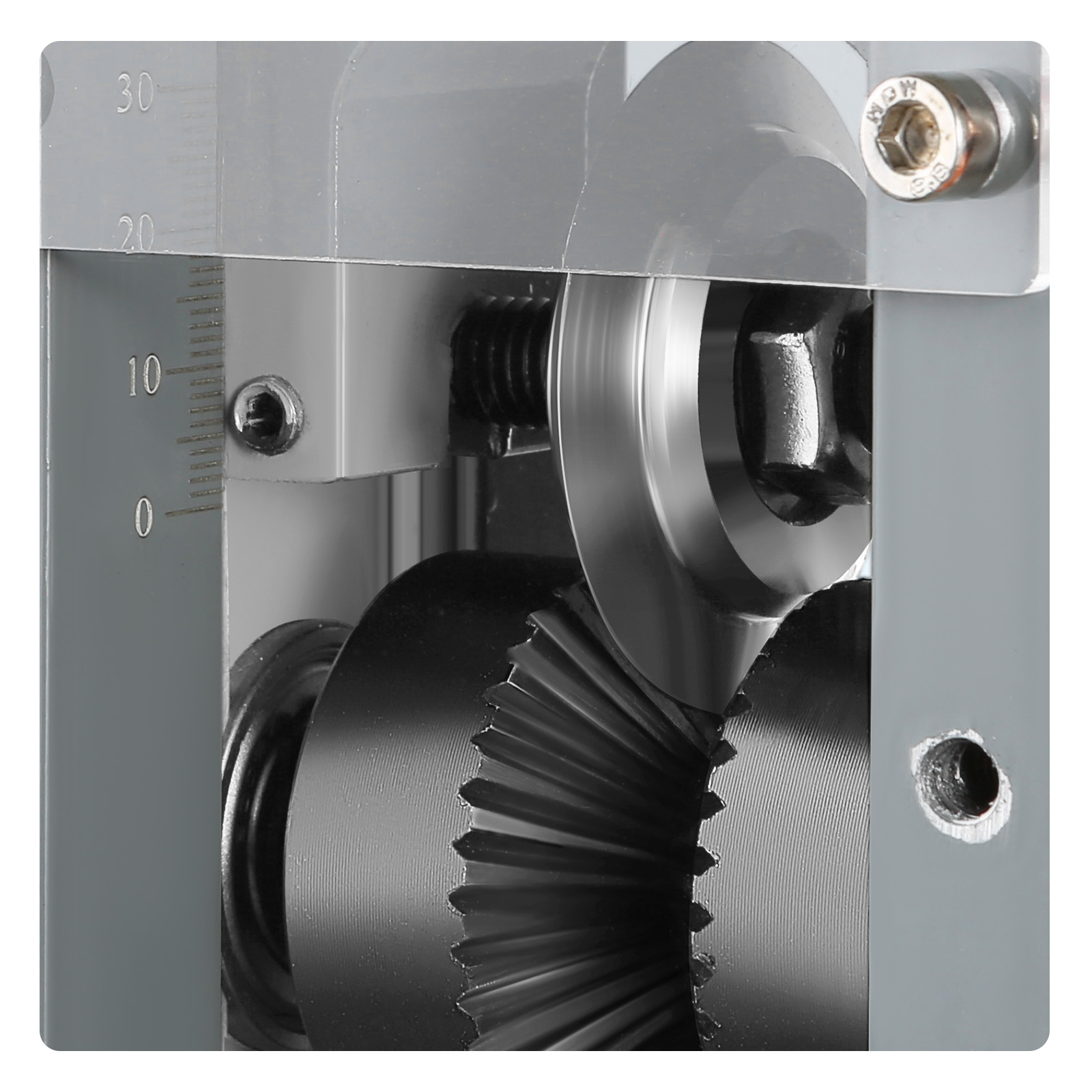 close-up of gears and blade in a VEVOR wire stripping machine, displaying numerical gauge marking.