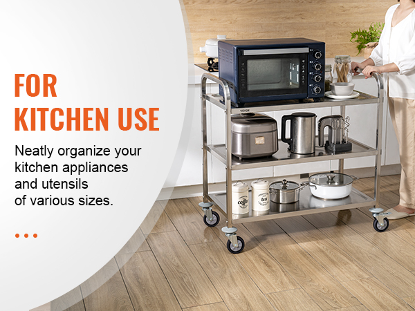 Тележка для кухонных принадлежностей VEVOR, в которой аккуратно разложены приборы и столовые приборы, включая микроволновую печь и тостер.