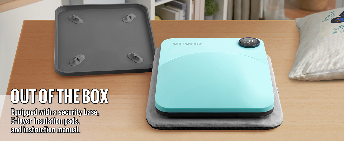 Термопресс-машина VEVOR с защитным основанием, изоляционными прокладками и инструкцией по эксплуатации на столе.