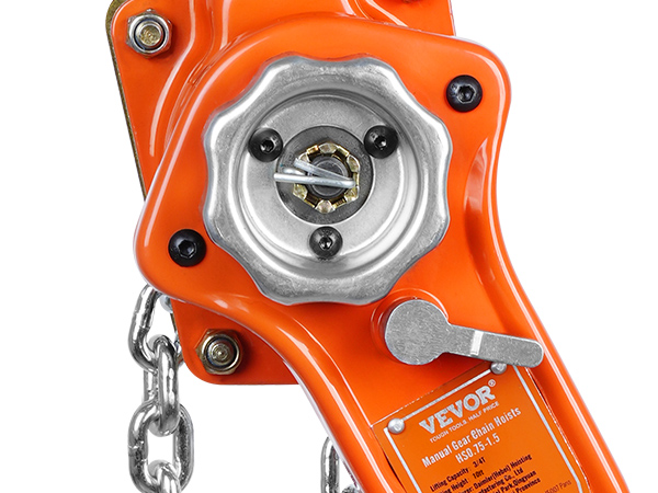orange VEVOR chain hoist with close-up of manual gear mechanism and metal chain.
