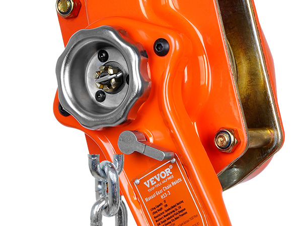 close-up of a VEVOR manual lever chain hoist in bright orange color with metal components and chain.