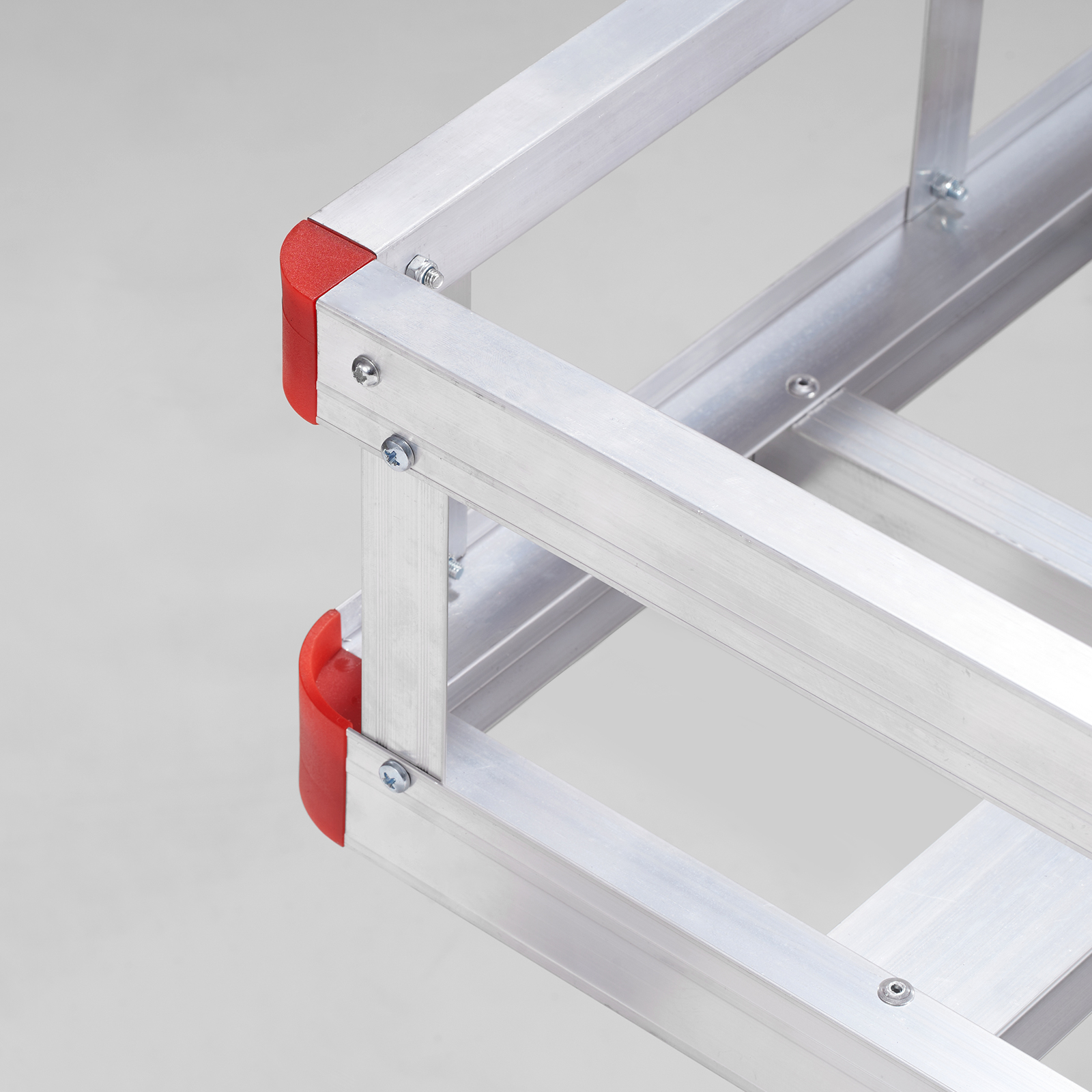 aluminum frame structure with red corner caps on VEVOR hitch cargo carrier.