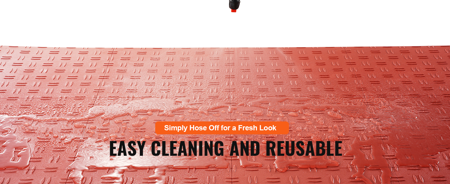 VEVOR garage tiles being hosed off, highlighting their easy cleaning and reusable features.