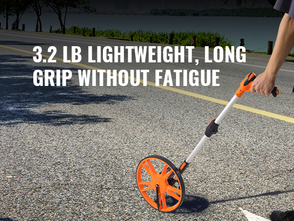 VEVOR measuring wheel in use on a road, highlighting its lightweight and ergonomic grip.