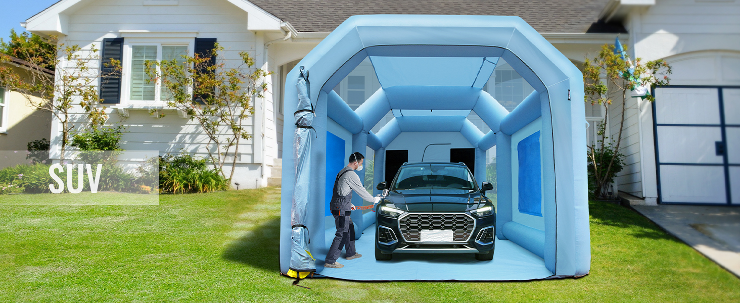 VEVOR inflatable paint booth with a black suv and a person detailing the vehicle in front of a house.