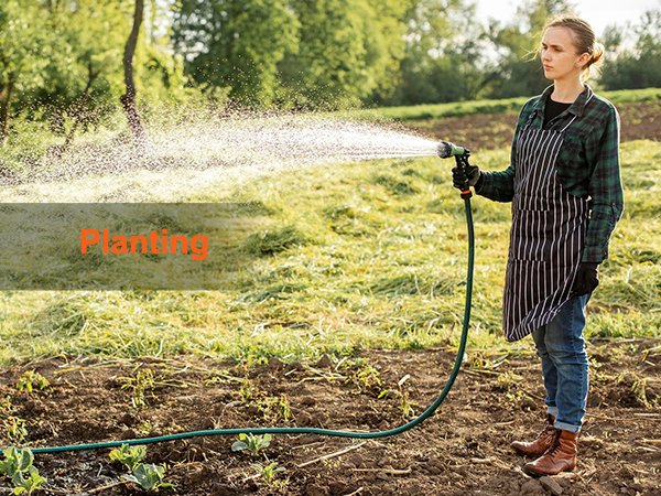 person watering plants in a field using a hose, promoting VEVOR water tank bladder for irrigation.