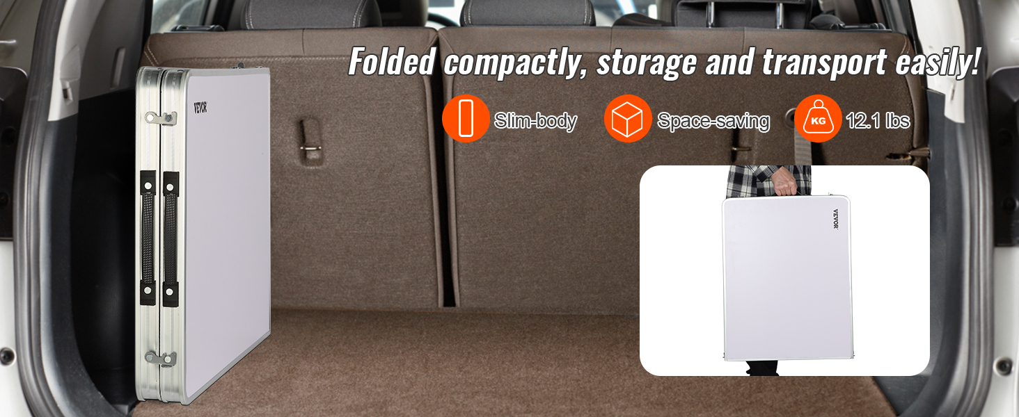 VEVOR camping table folded compactly in a car trunk, highlighting its slim, space-saving design.