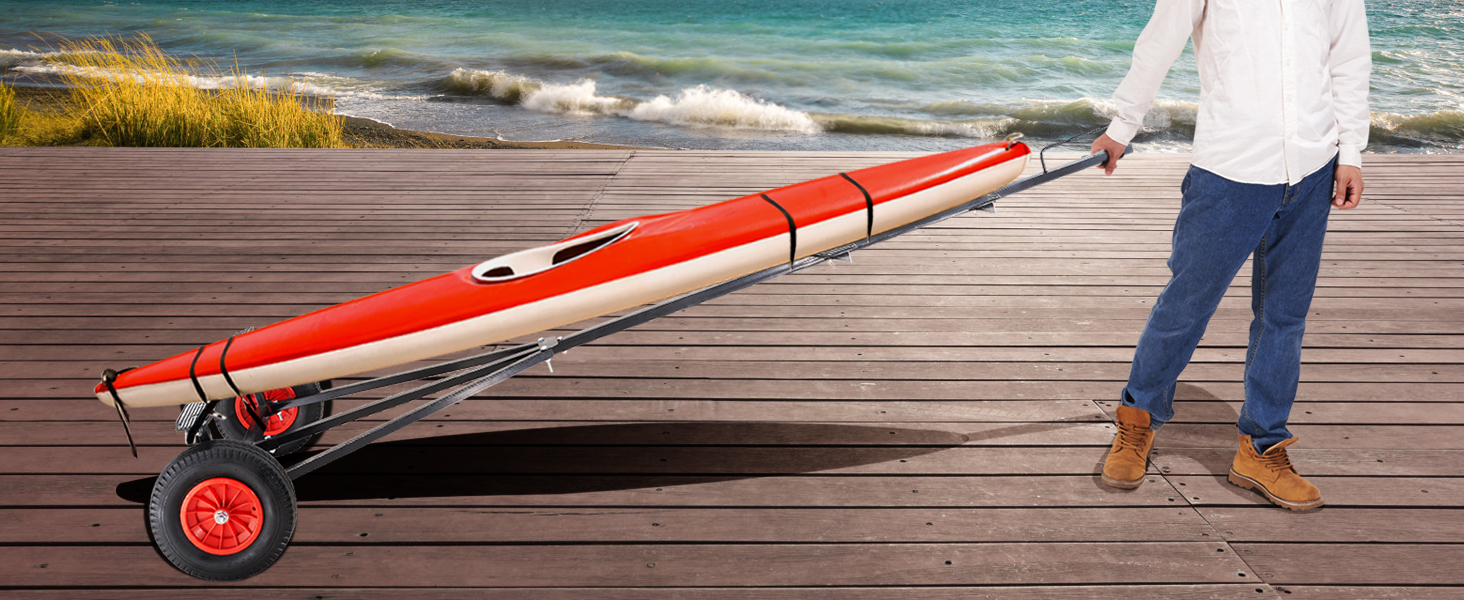 person pulling a kayak with a VEVOR boat trailer dolly on a wooden dock by the sea.