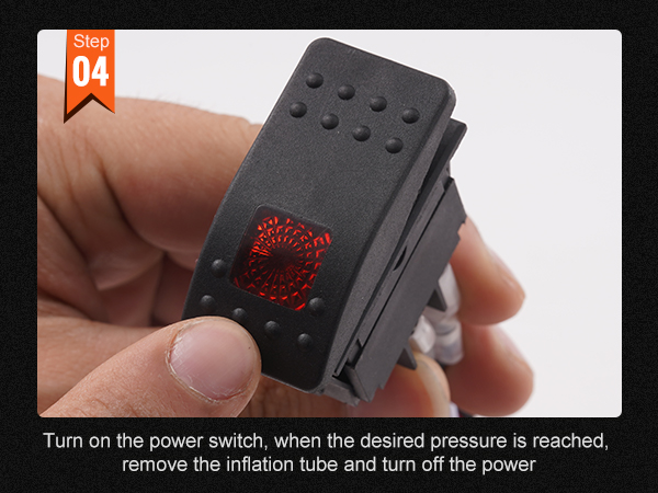 step 4 of VEVOR onboard air compressor kit; turning on power switch with close-up hand detail.