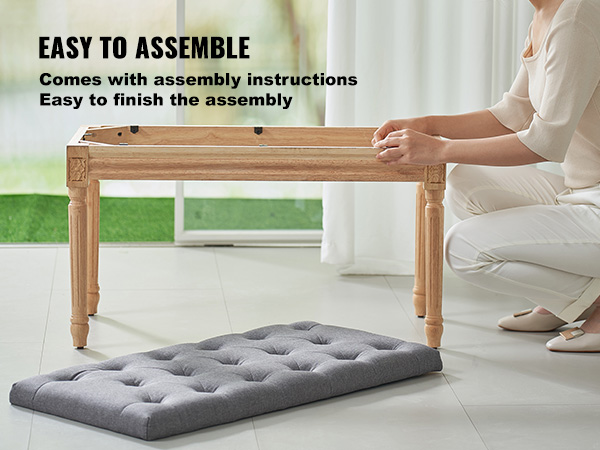 woman assembling VEVOR upholstered bench, highlighting ease of assembly with parts laid out.
