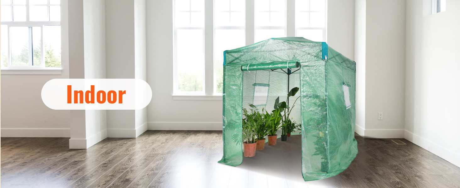 indoor VEVOR pop up greenhouse with green mesh, housing potted plants, placed on a wooden floor.