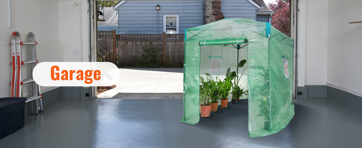 VEVOR pop up greenhouse in bright garage with growing potted plants and folded ladders nearby.