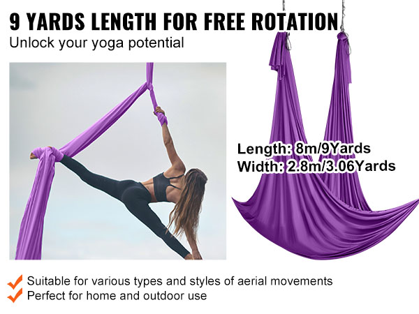 woman using VEVOR aerial yoga hammock with a 9-yard length for various aerial movements indoors.