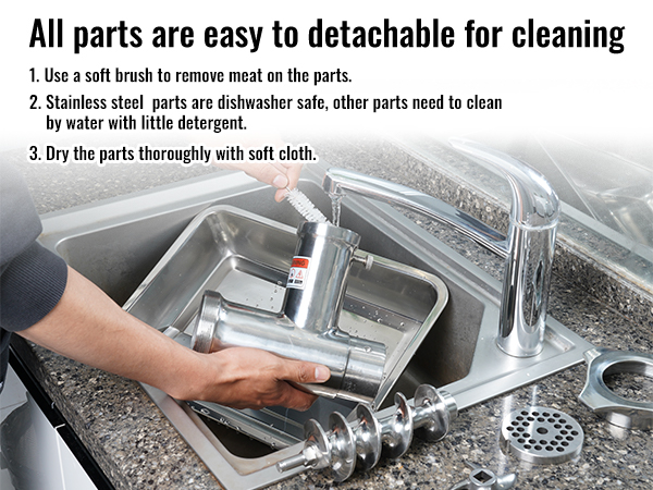 cleaning stainless steel parts of VEVOR electric meat grinder in kitchen sink with soft brush and water.