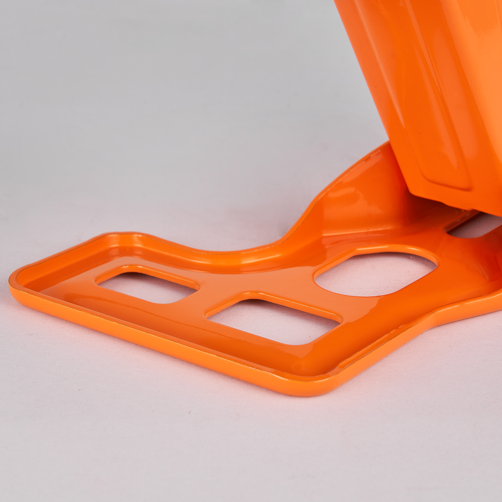 orange base plate of VEVOR electric car jack on white background.