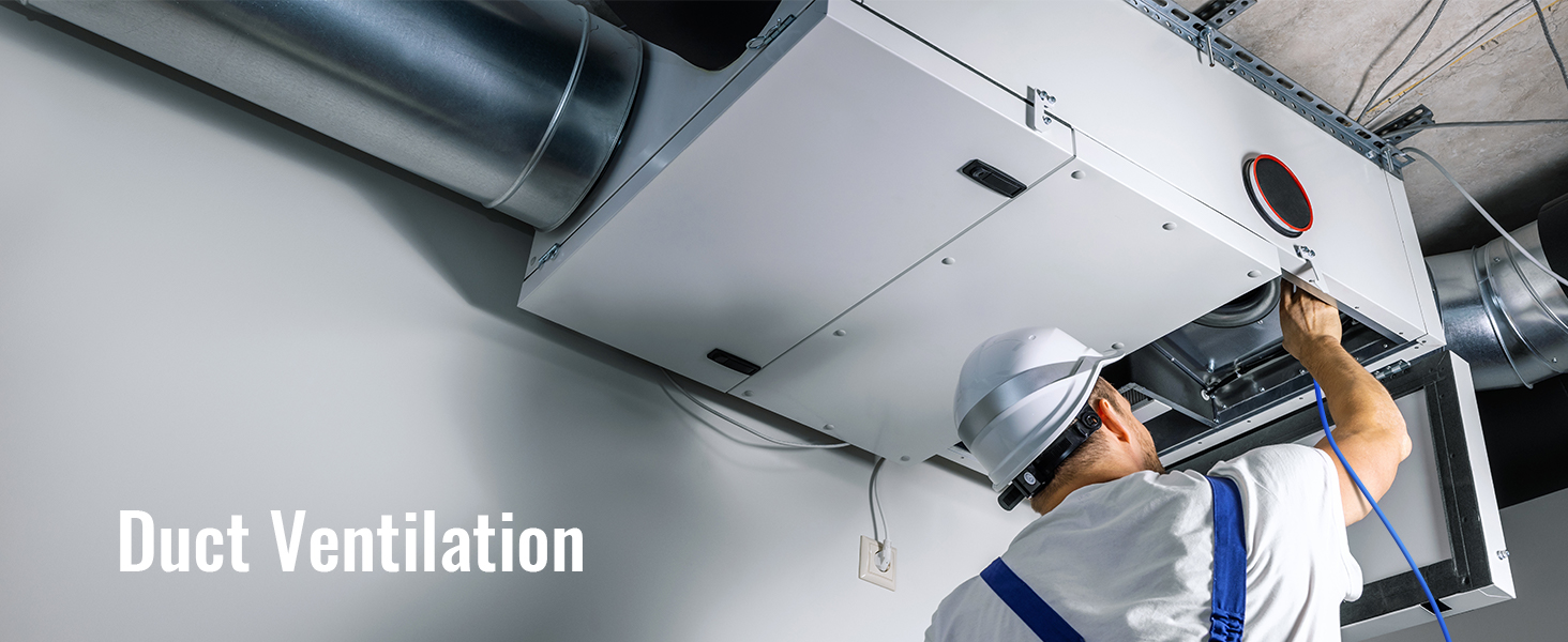 technikas saugos įrankius, atliekanti vėdinimo ortakių, vėdinimo sistemos komercinės paskirties pastatas.