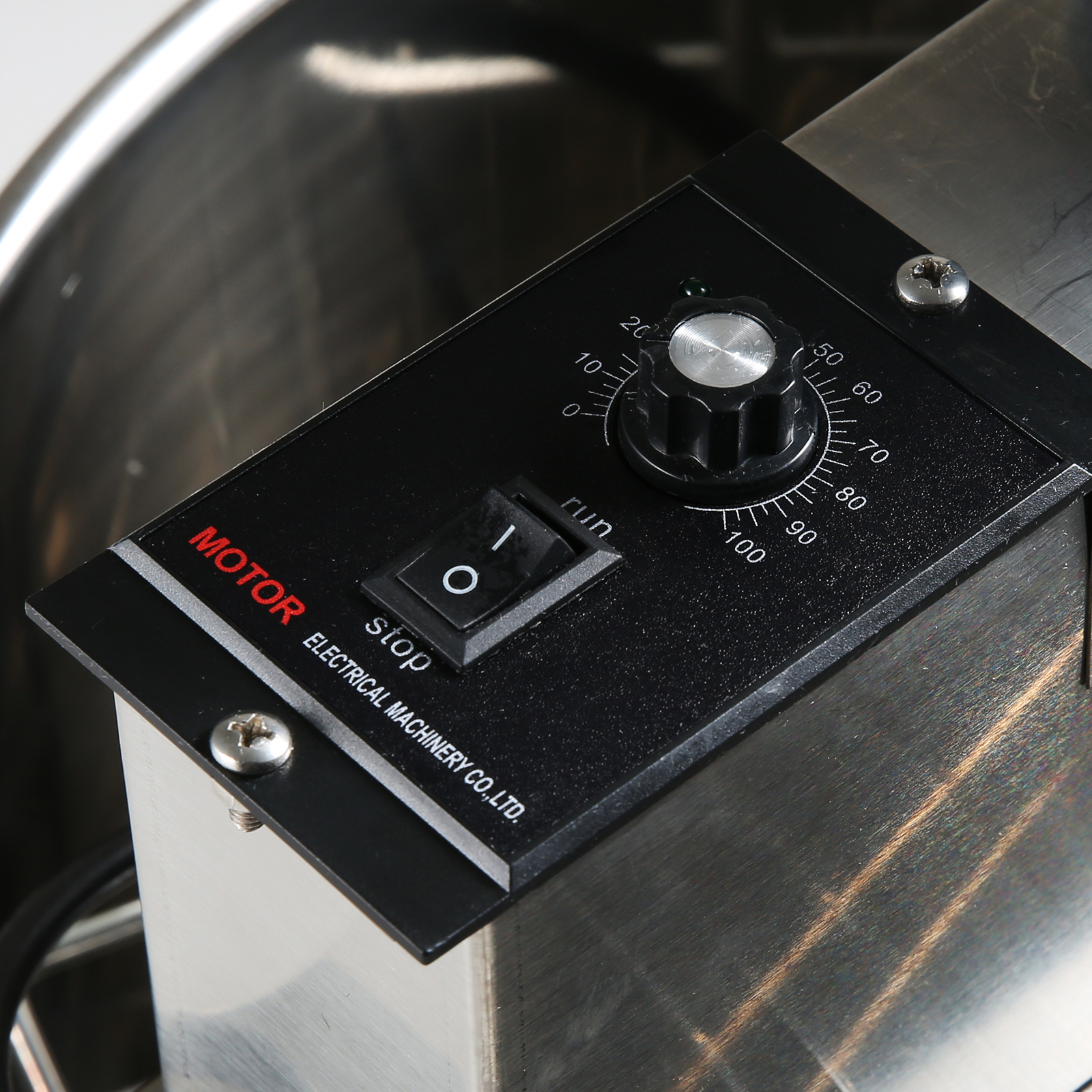control panel of a VEVOR electric honey extractor with speed dial and power switch.