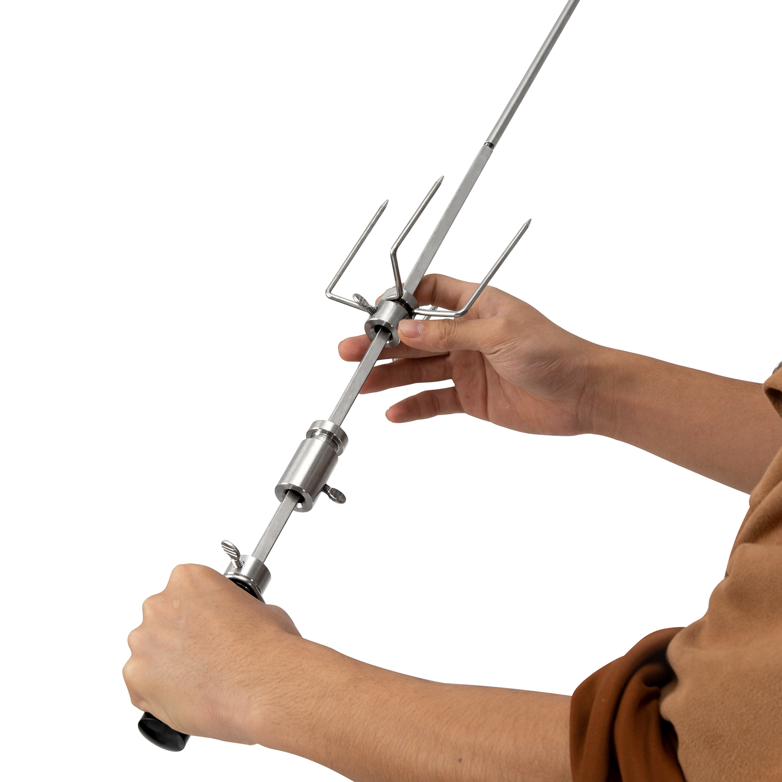 hands adjusting the skewer of a VEVOR grill rotisserie kit, showcasing stainless steel components.