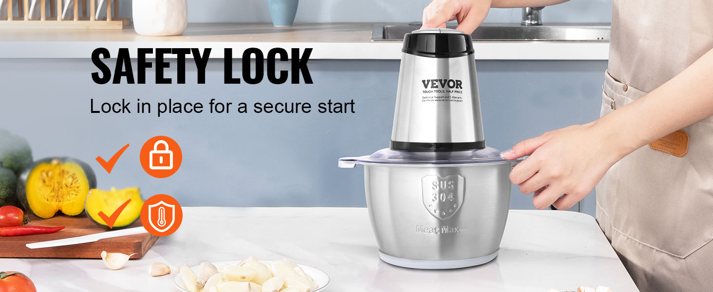 VEVOR electric meat grinder with safety lock, placed on a kitchen counter near vegetables.