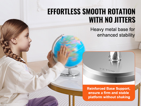 child rotating VEVOR rotating world globe on table with metal base and educational materials nearby.