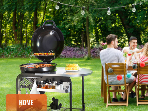 VEVOR charcoal grill in use at an outdoor gathering with cooked corn and spices on the side table.