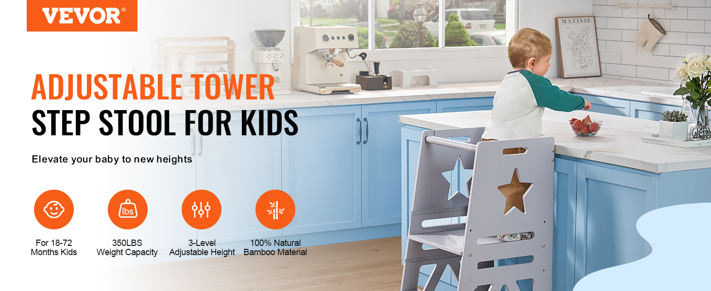 VEVOR tower step stool for kids in a kitchen with blue cabinets and a bowl of strawberries on the counter.