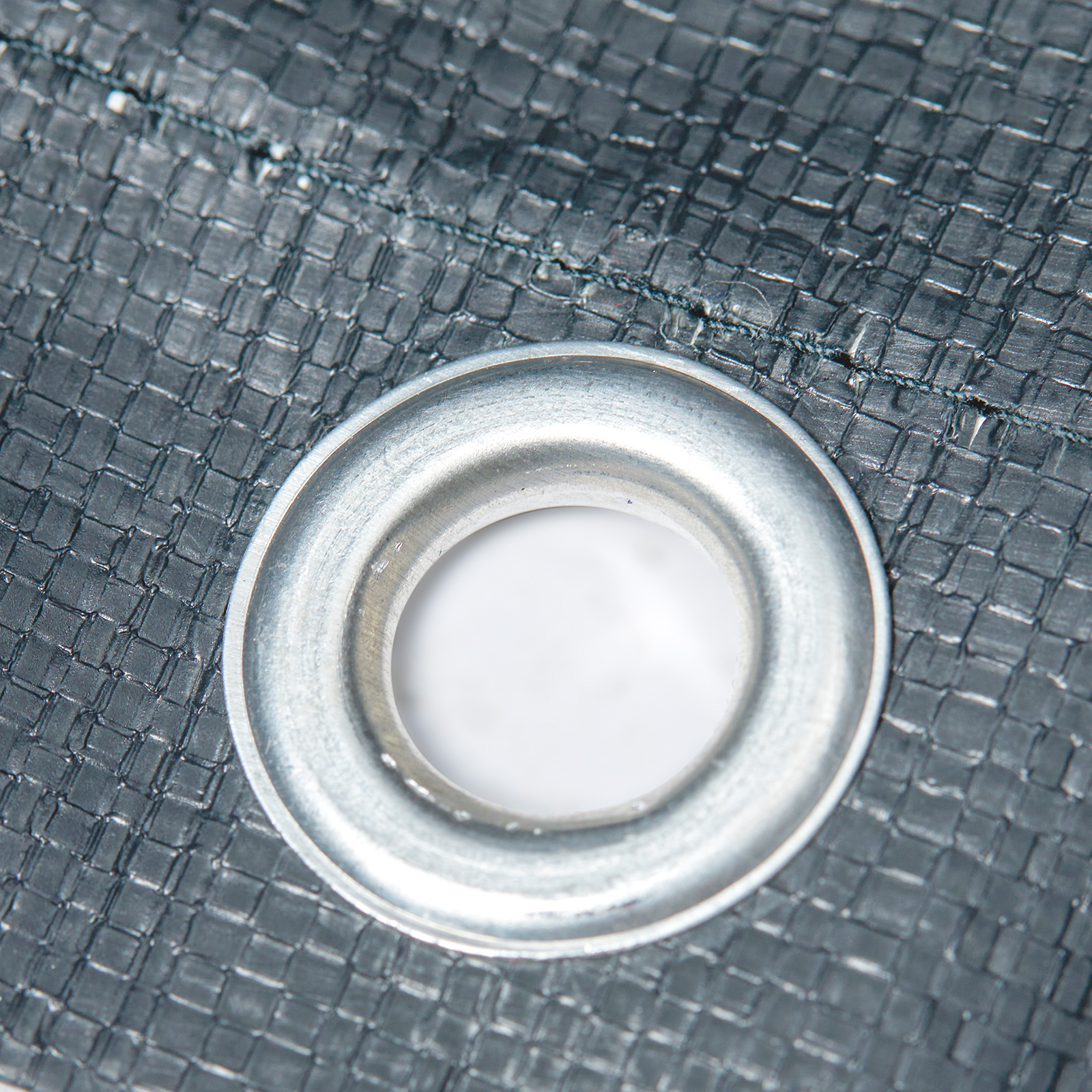 close-up of reinforced grommet on VEVOR carport 10x20's durable gray fabric cover.