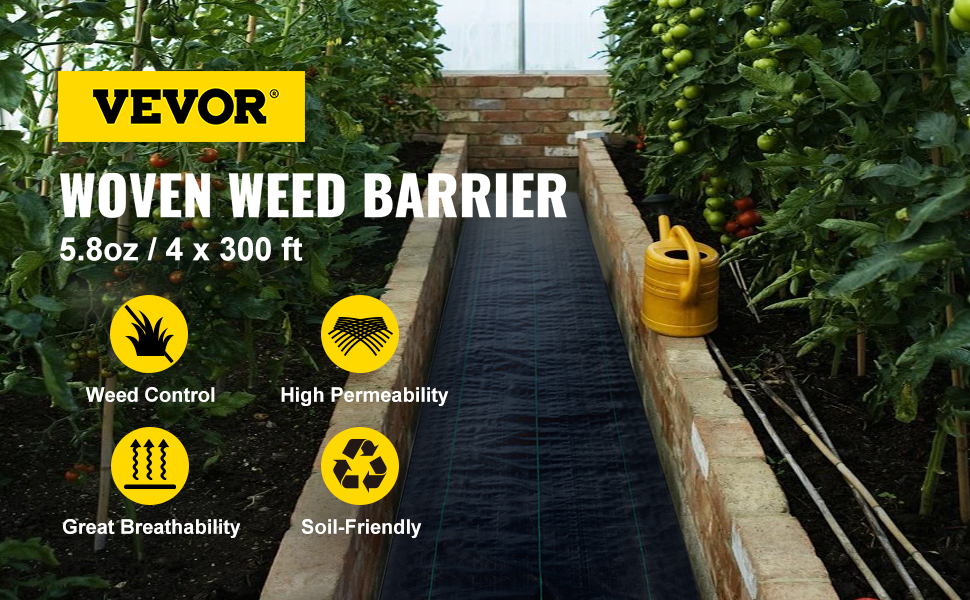 VEVOR weed barrier fabric in a greenhouse bed with a yellow watering can.