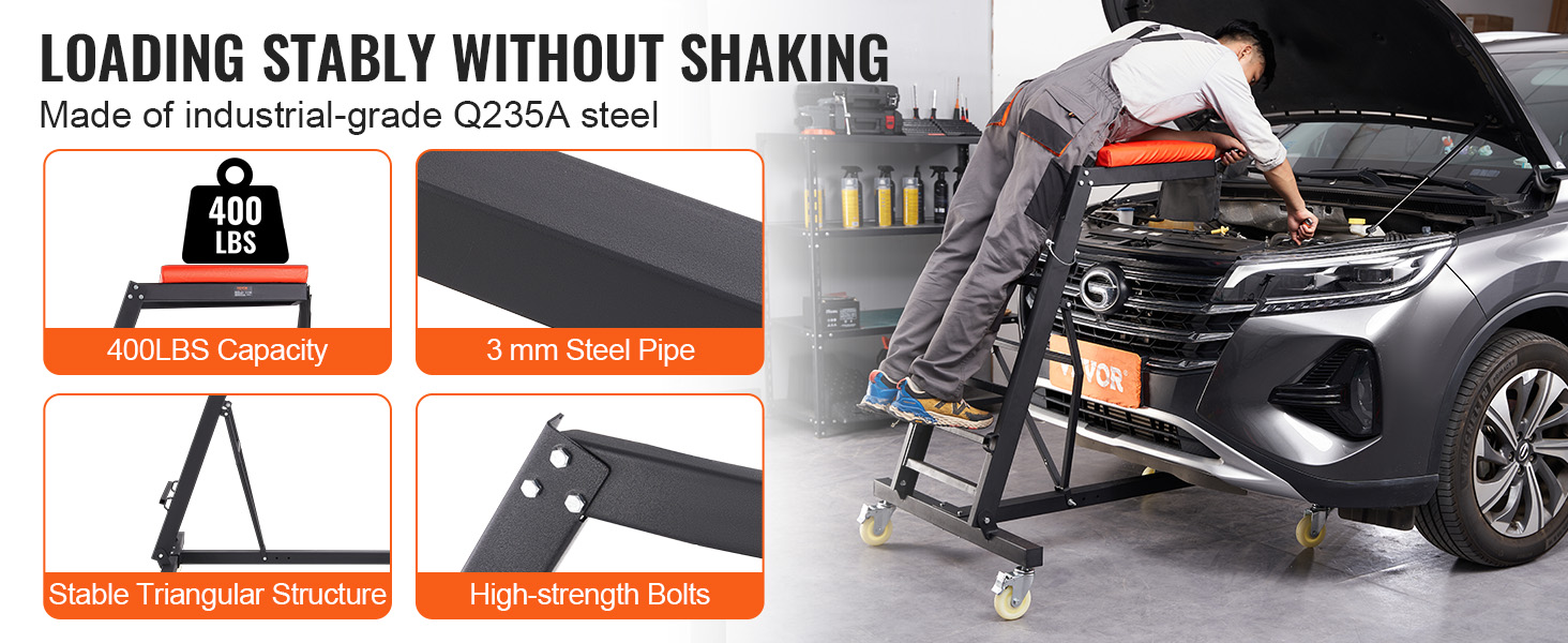mechanic using VEVOR automotive creeper with 400 lbs capacity and stable triangular structure.