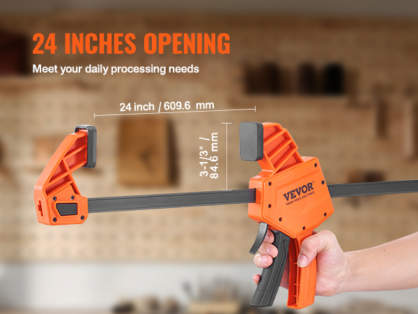 VEVOR woodworking clamps with 24 inches opening showcased by a person holding the clamp.