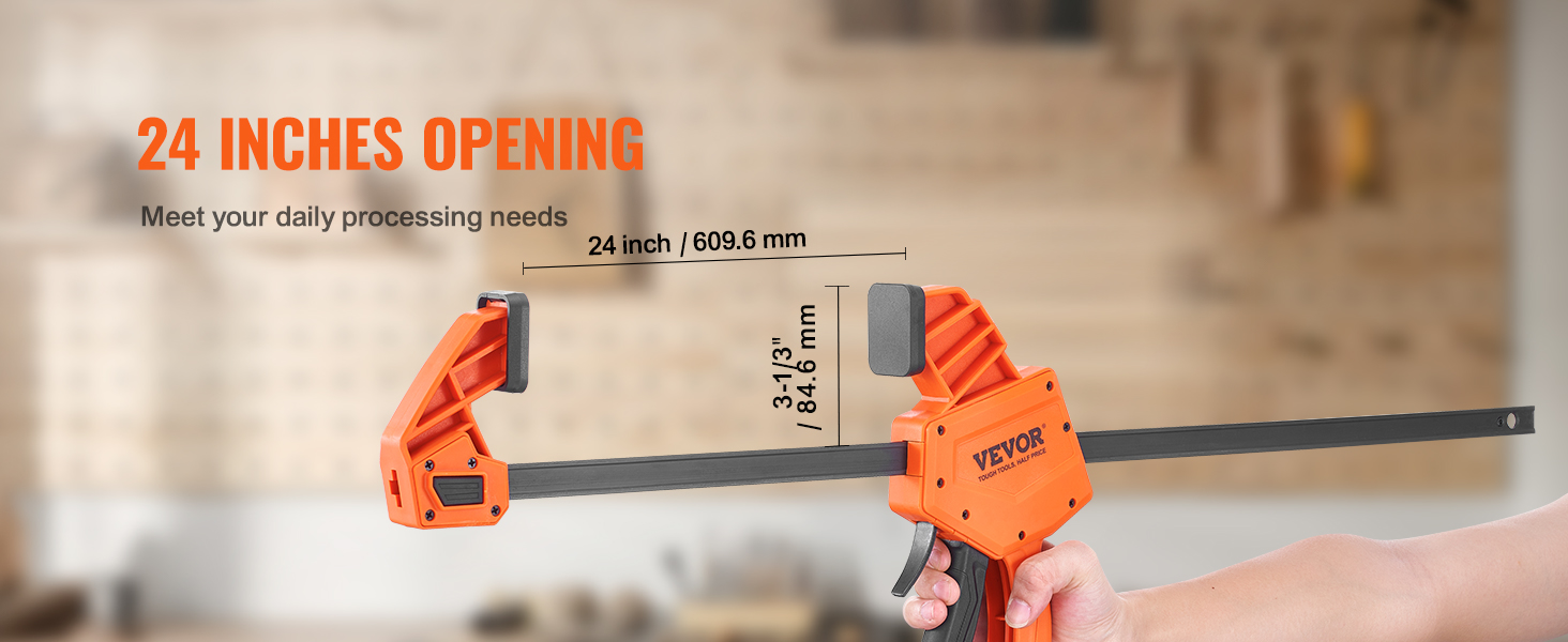VEVOR woodworking clamps with 24 inches opening showcased by a person holding the clamp.