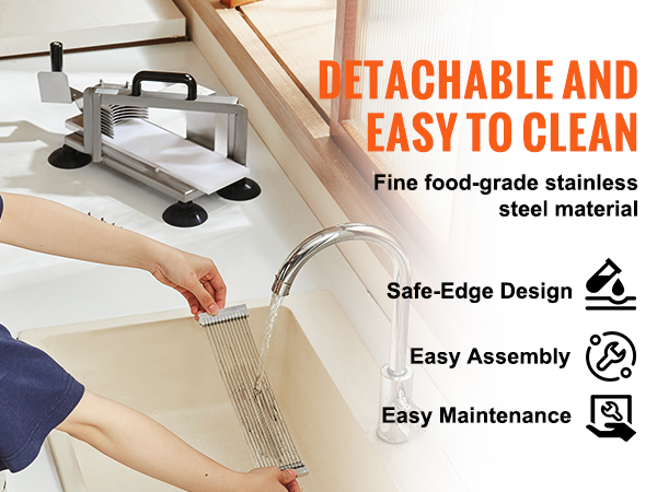 detachable VEVOR tomato slicer being cleaned under running water, highlighting its safe-edge design.