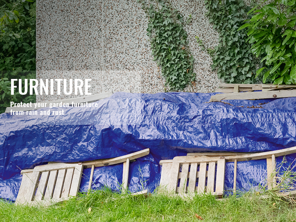 VEVOR waterproof tarp covering wooden garden furniture, protecting it from rain and rust in a green yard.