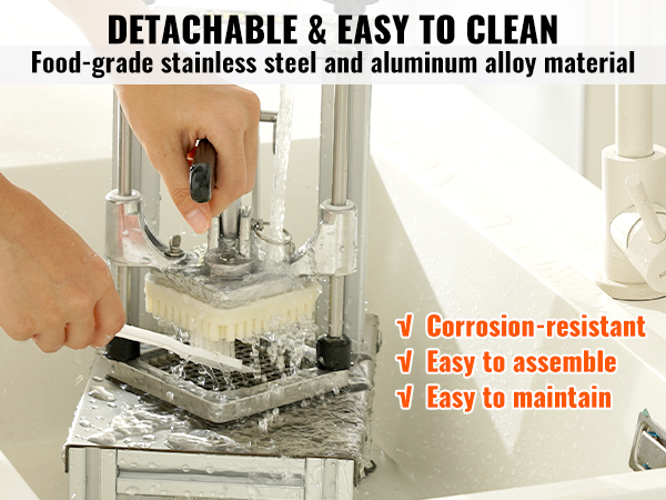 cleaning the VEVOR french fry cutter's stainless steel and aluminum parts in a kitchen sink.