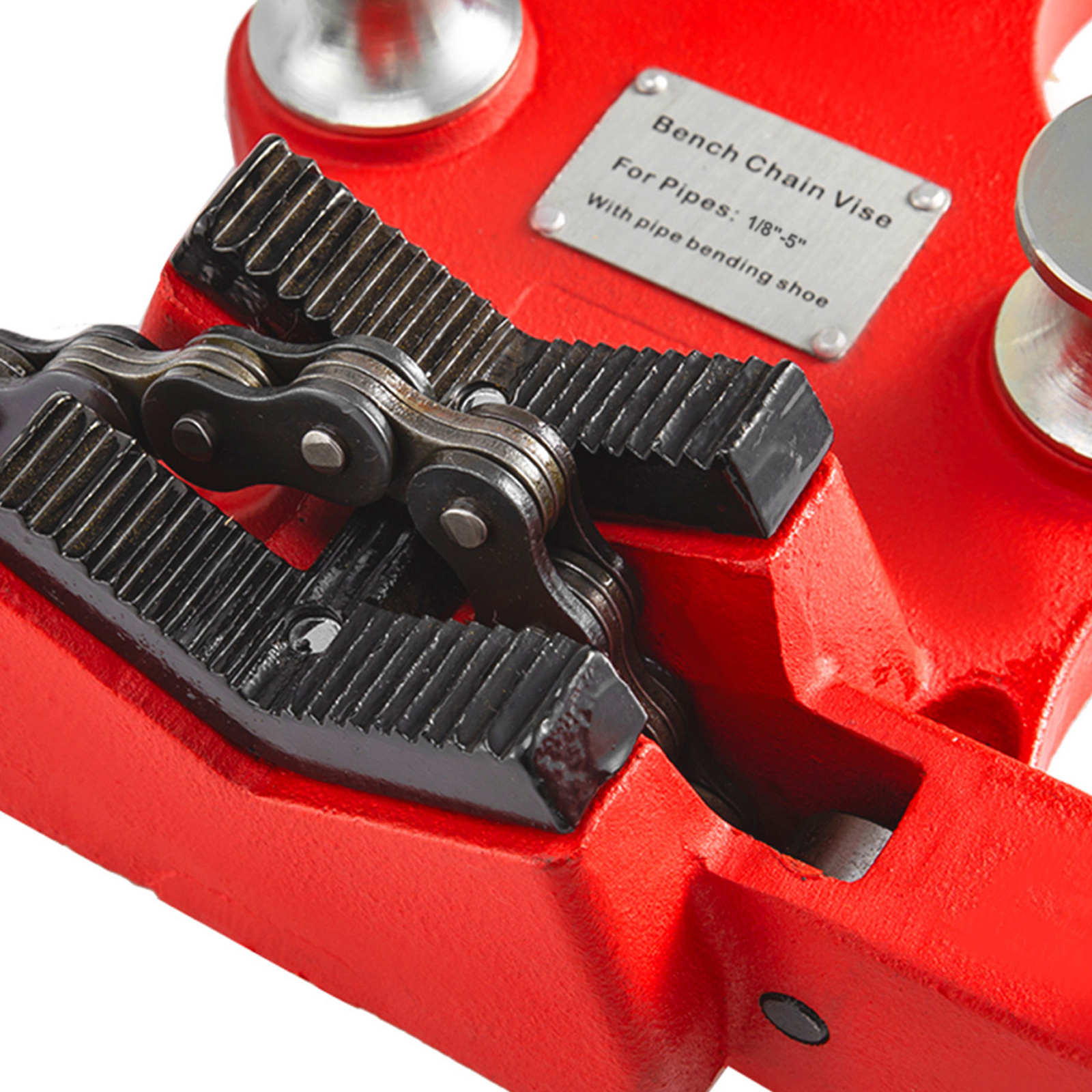 close-up of a red VEVOR bench chain vise for securing pipes.