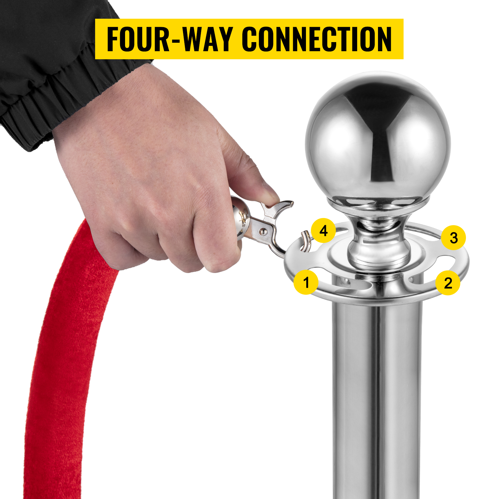 hand connecting a red velvet rope to a VEVOR crowd control stanchion with four-way connection.