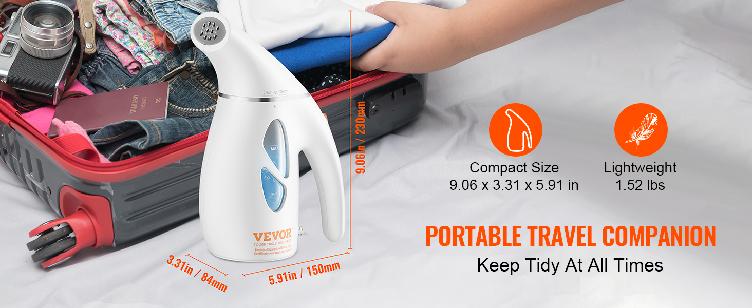 VEVOR handheld fabric steamer next to packed suitcase, showcasing compact size and lightweight design.