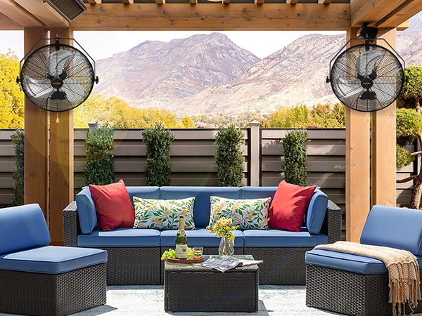 dual VEVOR wall mount fans on a wooden pergola overlooking a patio with a mountain backdrop.