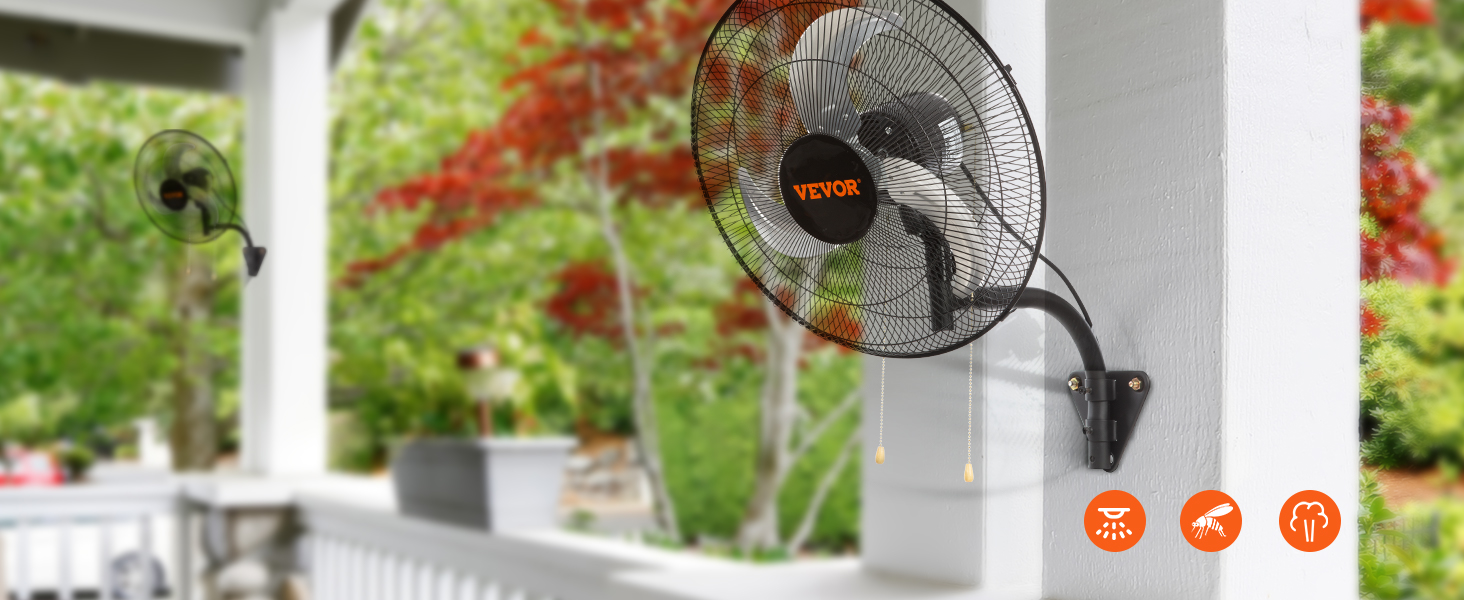 Настенный вентилятор VEVOR с функцией управления установлен во внутреннем дворике, окруженном зеленой и красной листвой.